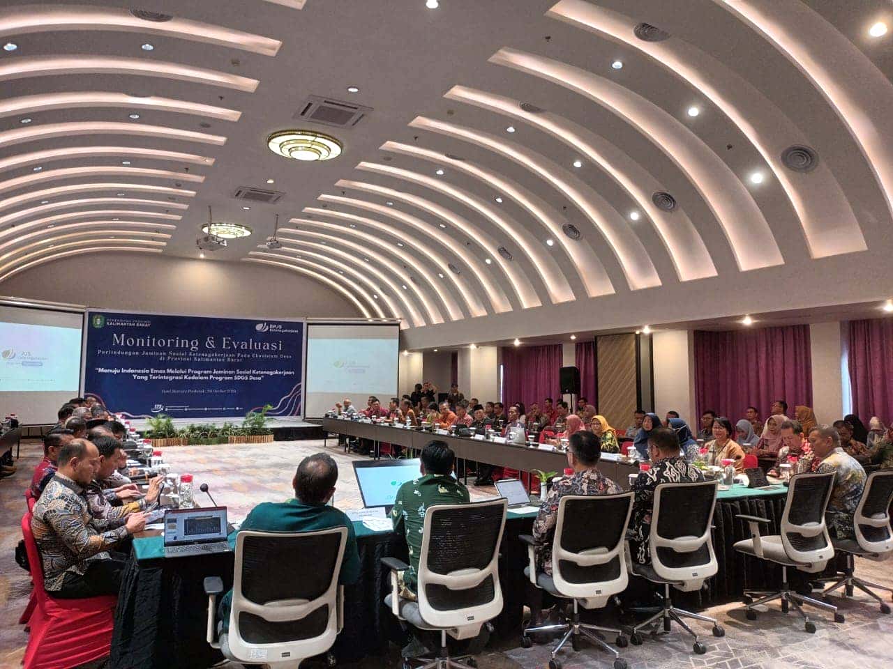 PEMDA SAMBAS HADIRI MONITORING DAN EVALUASI JAMSOSNEG PADA EKOSISTEM DESA KALBAR